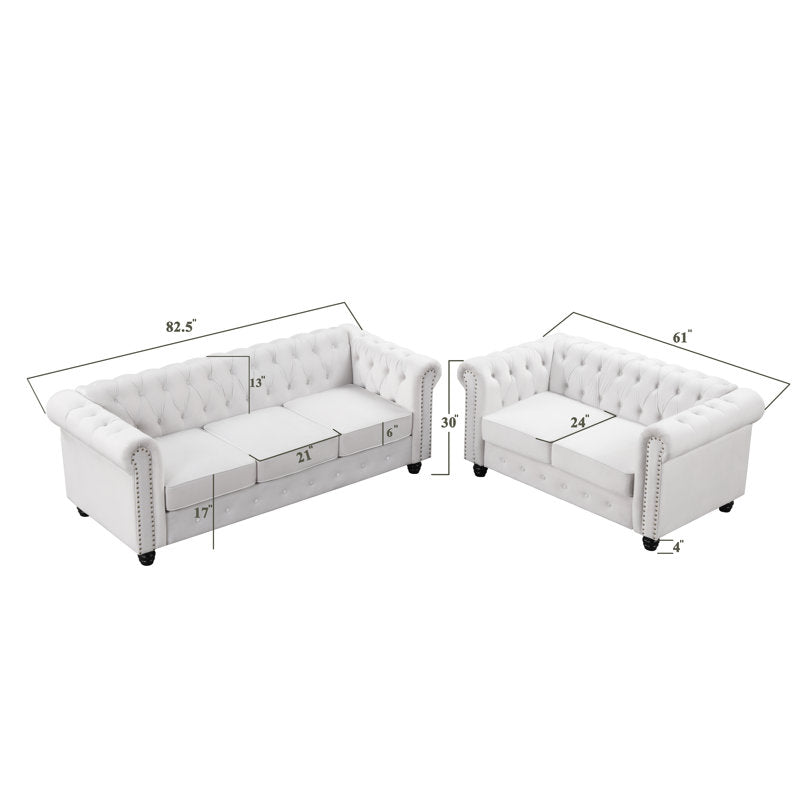 Luxury white Chesterfield 2 piece tufted sofa set of 5 with nailhead trim in elegant living room interior