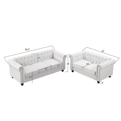Luxury white Chesterfield 2 piece tufted sofa set of 5 with nailhead trim in elegant living room interior