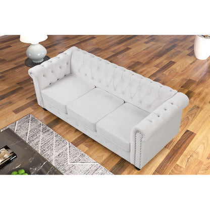Luxury white Chesterfield 2 piece tufted sofa set of 5 with nailhead trim in elegant living room interior