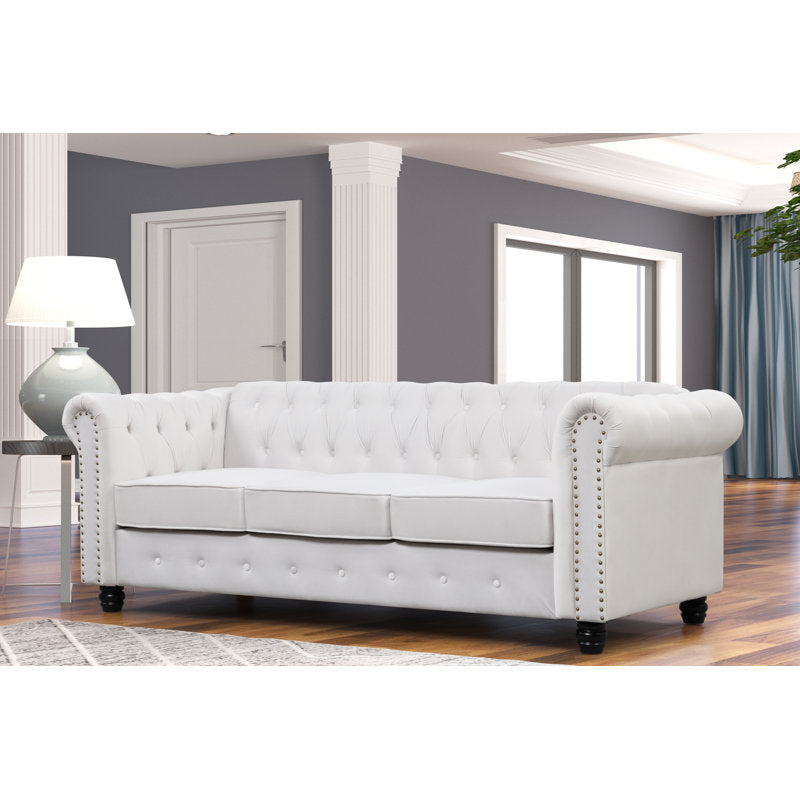 Luxury white Chesterfield 2 piece tufted sofa set of 5 with nailhead trim in elegant living room interior